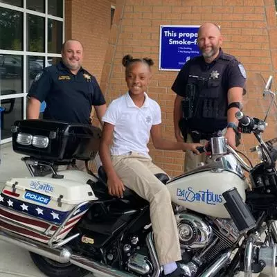 Girl on Police Motorcycle
